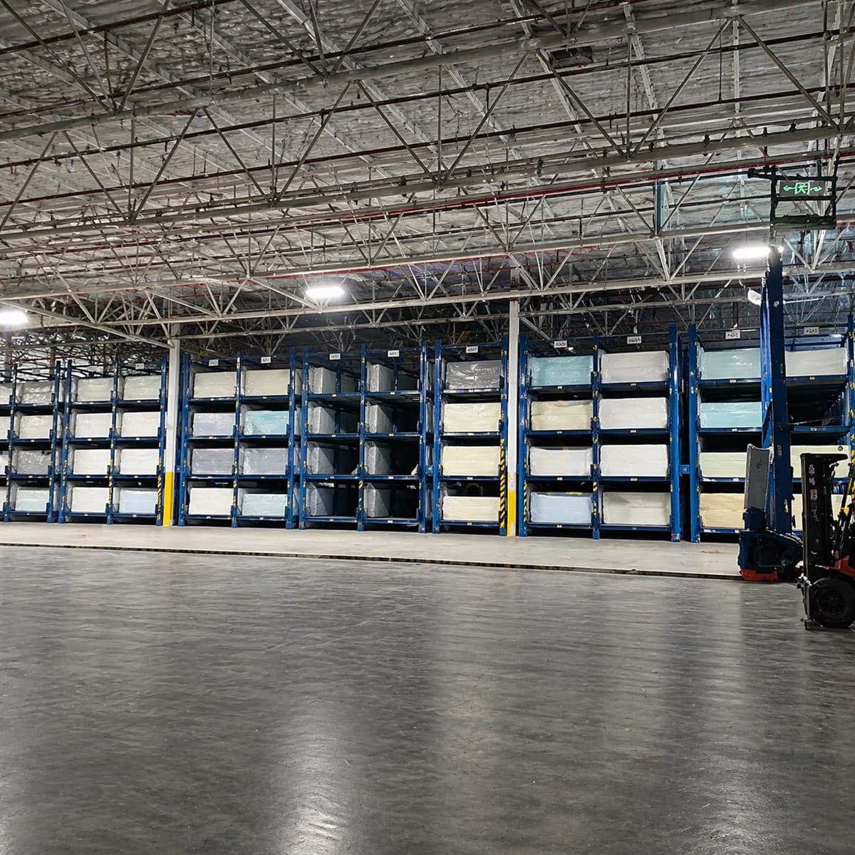 Mattress warehouse with stacked finished products